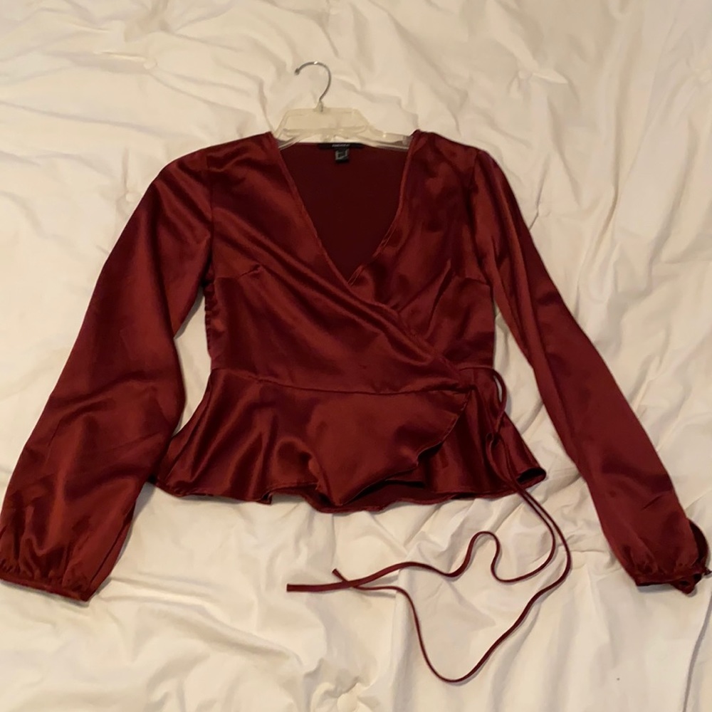 Blouse with tie-flapped detail on front